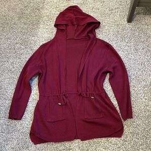 Long sleeve burgundy hooded sweater. Size large.